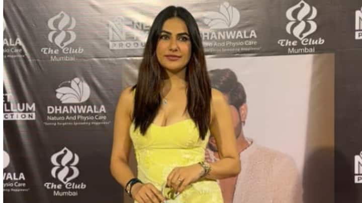 Tanvi Kolte attended the party wearing a vibrant yellow maxi dress featuring intricate floral embroidery and a sheer overlay.
