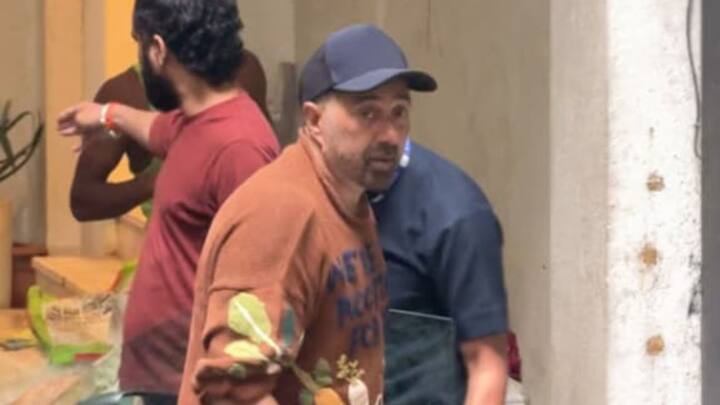 Sunny Deol was spotted at his residence. The actor kept it casual and comfortable as he was seen outside his residence. Dressed in a brown graphic T-shirt paired with light-coloured cargo pants, Sunny opted for a relaxed, laid-back look during the outing. (Image Source: ABP Live)