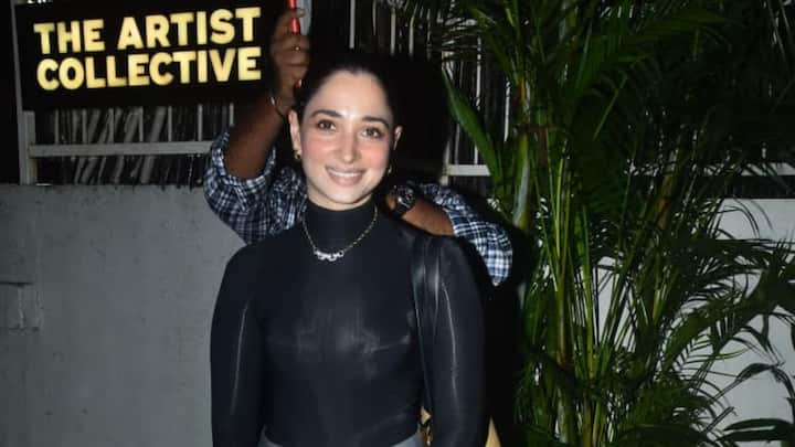 Tamannaah Bhatia spotted at Versova wearing a chic black turtleneck paired with wide-leg grey trousers.