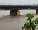 Photos Rain: ગુજરાતમાં 24 કલાકમાં 213 તાલુકામાં મેઘતાંડવ, પૂર્ણા નદીમાં પૂરથી નવસારી અને તાપીમાં હાહાકાર