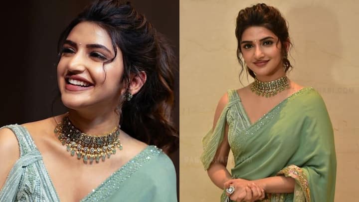 Sreeleela's green saree offers a fresh and modern approach to traditional dressing. The outfit features distinctive golden work, while the blouse adds a contemporary touch to the overall look. She styles her hair in a high ponytail, which complements the outfit and gives it a trendy finish. This look is worth considering if you want to move beyond conventional festive styling and try something different.