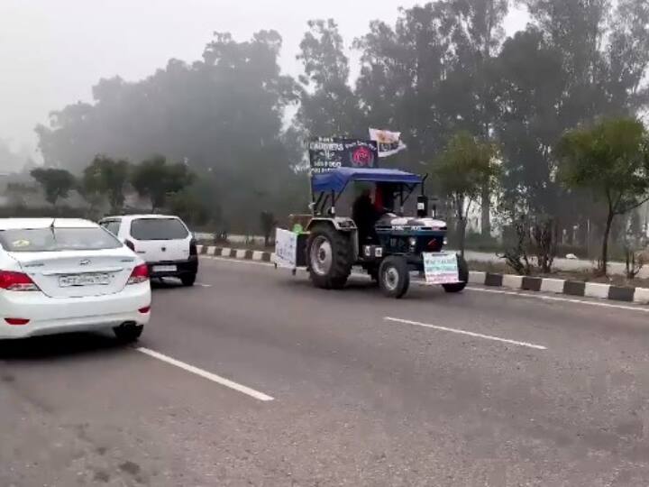 WATCH Viral video Punjab Farmer Drives Tractor In 'Reverse Gear' Demanding Centre To Repeal Farm Laws WATCH | Punjab Farmer Drives Tractor In 'Reverse Gear' Demanding Centre To Repeal Farm Laws