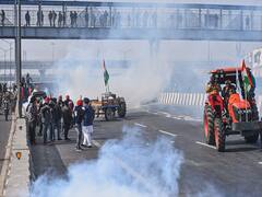 IN PICS: Cops Use Tear Gas, Lathicharge As Protesting Farmers Try To Break Barricades At Several Points In Delhi
